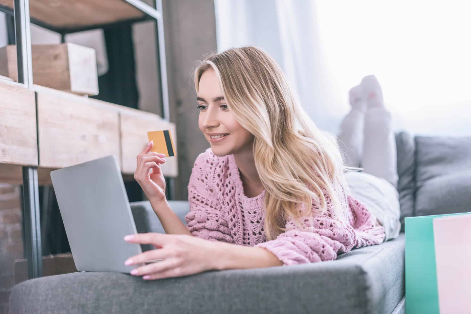 A woman shops online from home